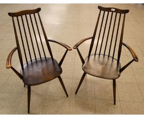 A pair of Ercol Golden Dawn elm and beech Goldsmith chairs 