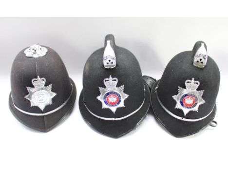 Two vintage custodian helmets for West Yorkshire police and one for West Midlands police 