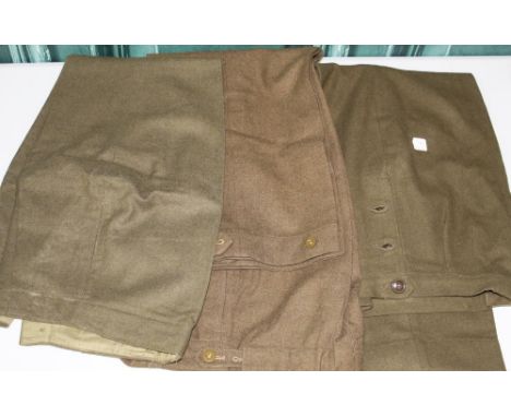 Three pairs of WWII American nurses wool battle dress trousers with side button fastenings, one pair 1945 