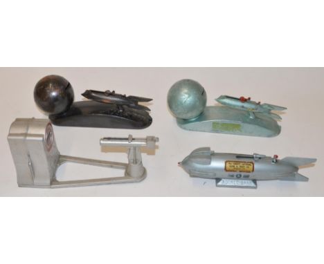 Four vintage cast metal money banks, all with functioning mechanisms, Duro Rocket Bank. L 20.5cm.Duro Atomic Bank. L 21cm and