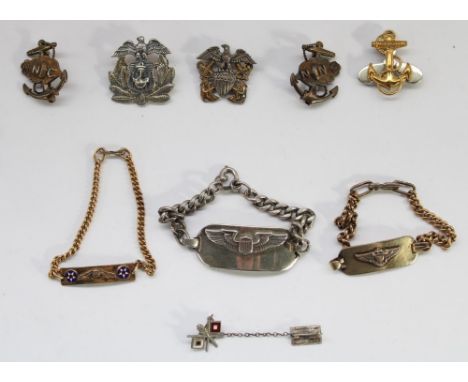 Selection of US military WW2 era sterling silver insignia including three sweetheart bracelets (US Navy pilots not silver) 