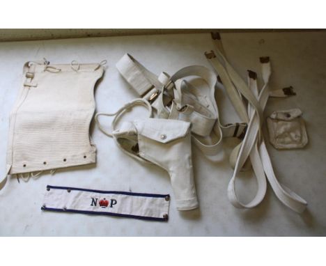 Naval Police items including webbing belt, garters, armband, ammunition pouch, three Lee Enfield slings, holster belt and sho