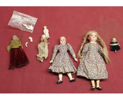 Selection of small and miniature late C19th/early C20th bisque dolls and bisque headed dolls with glass eyes with three froze