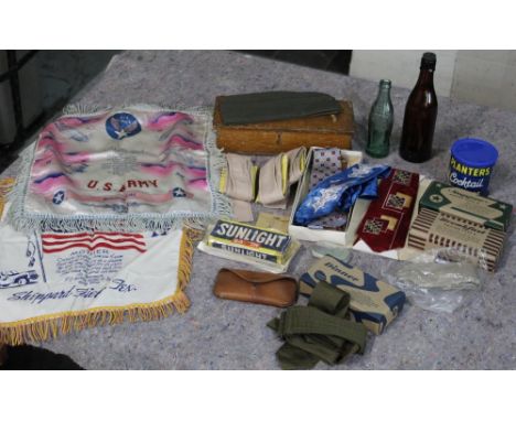 Super ration type K, silk ties, dog tags, empty tin of Planter's cocktail peanuts, aviators glasses case, United States Brewe