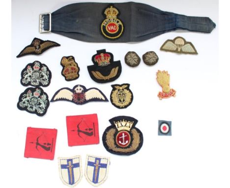 Selection of British military WW2 era cloth and bullions badges and patches, including Voluntary Aid Detachment arm band, Bri