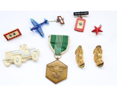 WW2 era US Army commendation medal together with a selection of US Army Air Corps WW2 plastic non-war material plastic badges