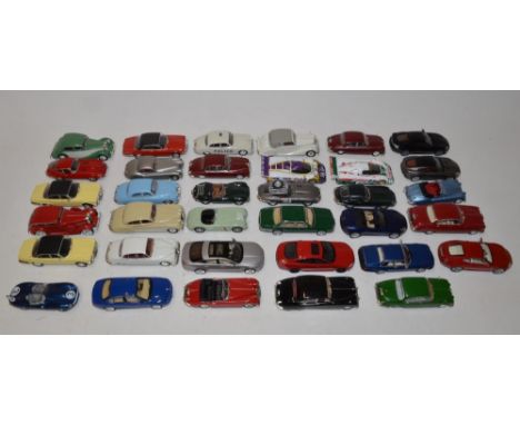 Collection of 35 mostly 1:43 scale model cars, mostly Atlas additions, all un boxed 