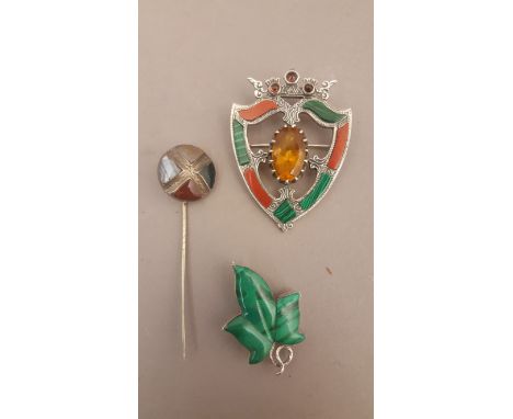 A SCOTTISH SILVER AND AGATE BROOCH of shield shape, set with malachite and agate, 5 x 4cm., together with an agate set stick 