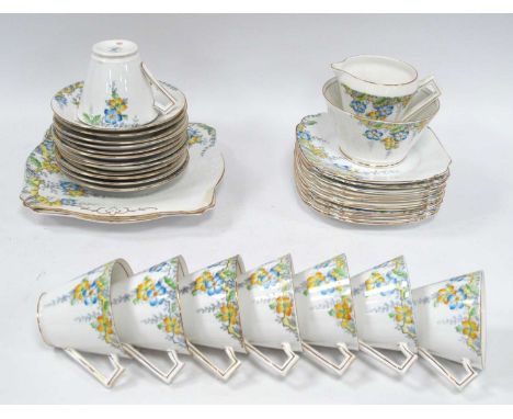 Salisbury 'XL' part tea service decorated in hand painted blue and yellow flowers, comprising of teacups, saucers, side plate