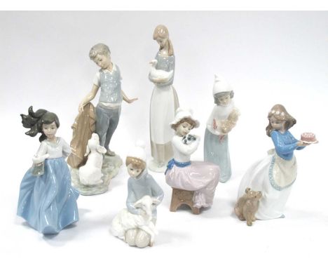 Lladro Figures, one holding cockerel, the other (damaged) holding sheep, five Nao figurines:- One Tray.