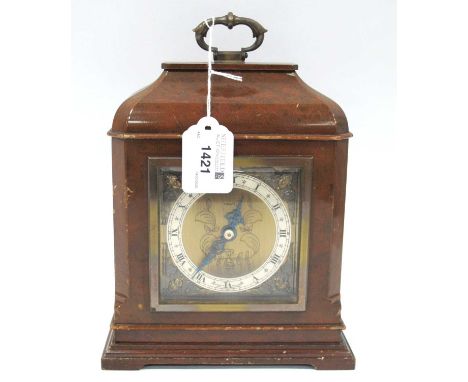 Elliott Walnut Cased Mantel Clock, with brass carrying handle, silver chapter ring, Roman numerals, 17cm wide.case has many s