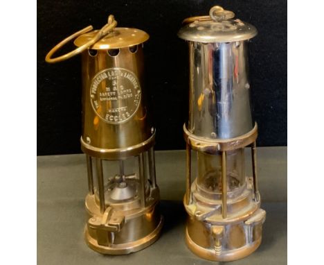 A Protector Lamp &amp; Lighting Co Ltd type 6 Miners lamp, another unmarked  (2) 
