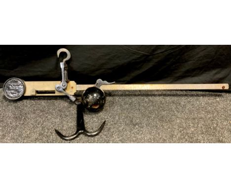 A mid-20th century butcher's steelyard balance scales, 300lb, dated 1955, 104cm long 
