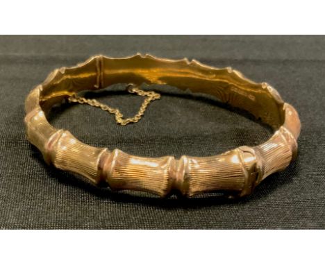 A 9ct gold vertebrae link hinge bangle, 12.5g 