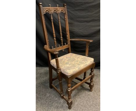 And Ercol ‘Old Colonial’ model high-back armchair. 