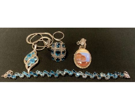 A 925 silver and multitone blue and white paste diamond and topaz effect dress ring, stamped 925 RGB;  similar pendant neckla