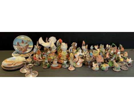 A quantity of decorative birds including; a Royal Crown Derby 'Long tailed tit', Border fine arts 'Wren and diamond ring','Go