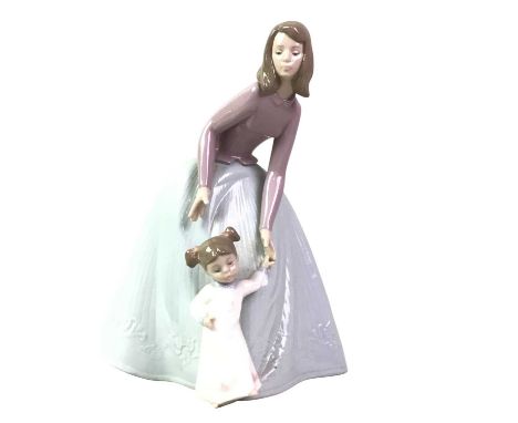 FOUR NAO FIGURES OF CHILDREN, along with a Lladro figure, each with stamp marksTallest 26cm highQty: 5