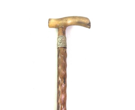 GROUP OF VINTAGE WALKING STICKS, along with an umbrella 