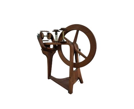 MID CENTURY TEAK AND BENTWOOD SPINNING WHEEL, on tripod supports, with various attachments and two patents turkey rug wool ga