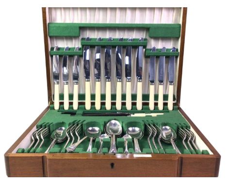 CANTEEN OF SILVER PLATED CUTLERY, six place setting, including four serving spoons carving knife, fork and sharpener, the wal