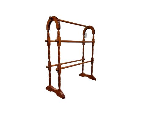 STAINED WOOD TOWEL RAIL, ALONG WITH A FLOOR LAMP AND A TRAY  the iron floor lamp with tripod supports, the tray decorated wit