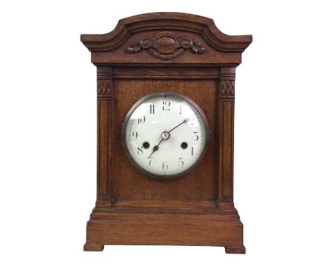 EDWARDIAN MANTEL CLOCK, OF ARCHITECTURAL DESIGN the circular white enamel dial with Arabic numerals and eight day movement, c