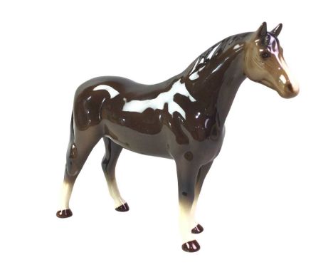 COLLECTION OF CERAMIC ANIMAL FIGURES, including two Nao geese, a sheep, and five horsesthe largest horse 18cm high