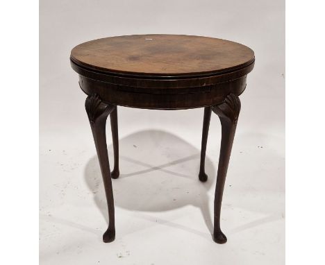 Early 20th century mahogany adaptable coffee table/card table&nbsp;of circular form, the top rotating to reveal four token tr