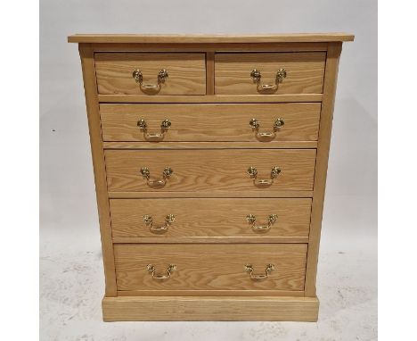 Two similar light oak chests of drawers&nbsp;by The Cotswold Caners, each having two short over four long drawers of graduati