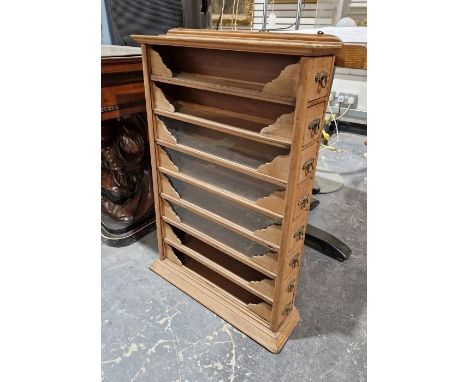 20th century wooden spice rack/cabinet&nbsp;having eight slide-out drawers and four glass-fronted sections, 78cm high&nbsp;