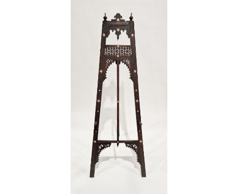 Late 19th/early 20th century Moorish style ebonised artist's easel, possibly by Liberty &amp; Co, with ornate carved and pier