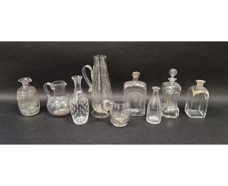 Collection of late 18th to 19th century cut and engraved jugs and decanters including three spirit decanters, a barrel-shaped