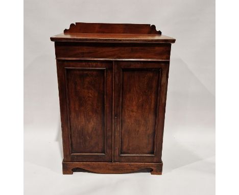 Victorian mahogany cabinet having one drawer raised above a two door cupboard, the cupboard opening to reveal one shelf, 104c