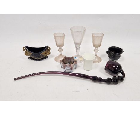 Three 18th century continental soda drinking glasses&nbsp;on baluster stems and folding feet (crizzled), one from the Profess