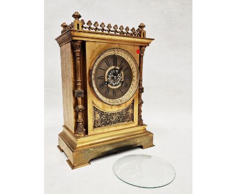 Moulded brass mantel clock&nbsp;of rectangular form with Gothic revival decoration, the dial with embossed bezel, pierced cen