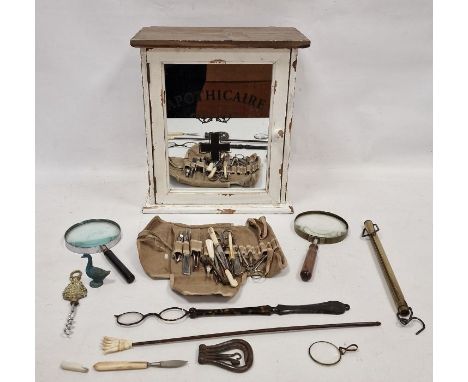 Wooden-handled bone back scratcher&nbsp;in the form of a hand, a vintage white painted mirror-fronted 'Apothecaire' cabinet, 