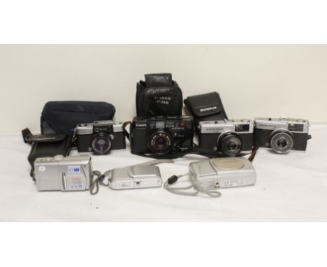 Selection of vintage film and digital cameras to include two digital Olympus cameras, two Olympus Trip 35 film cameras and a 