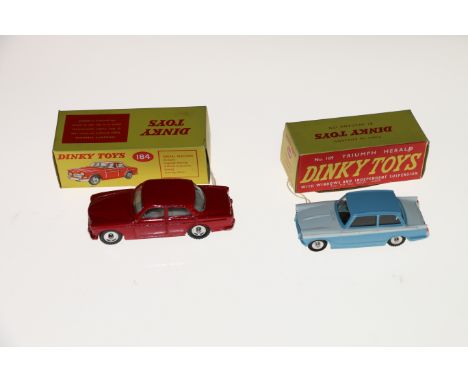 Two&nbsp;Dinky Toys diecast model vehicles; 184 Volvo 122S car with red body and spun hubs and 189 Triumph Herald saloon car 