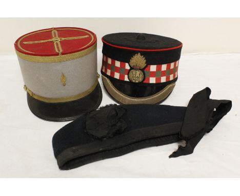 Highland Light Infantry officer's dress cap, an antique French military officer's Kepi and another. (3). 