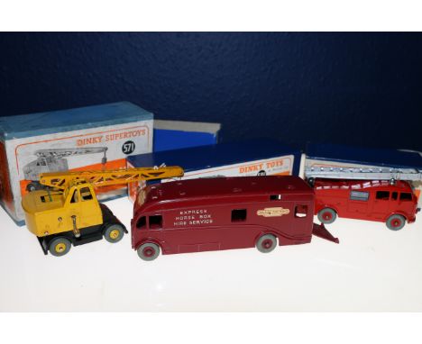 Dinky Toys diecast emergency model vehicle 555 Fire Engine with extending ladder, 571 Coles Mobile Crane with yellow body and
