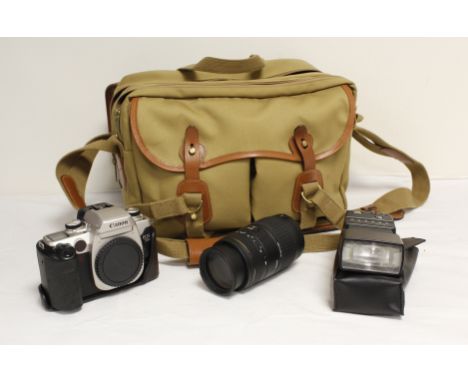 Canon 50E SLR film camera with modern Sigma 70-300mm F4-5.6 APO macro super and Canon flash gun, in carry bag. 