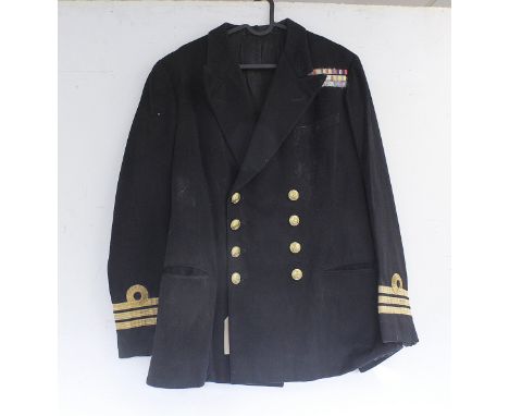 British Royal Navy dress uniform jacket having Gieves Limited of London label "51327 Mr P R D Johnston 11932 Portsmouth 27.31