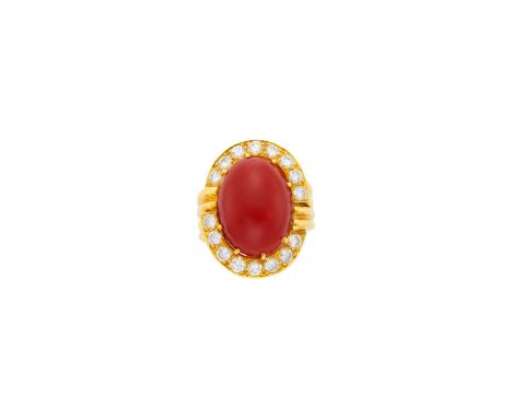 18 kt., one oval cabochon oxblood coral ap. 18.0 x 13.6 x 6.8 mm., 16 round diamonds ap. 1.60 cts., ap. 10.2 dwts. Size 5 1/4