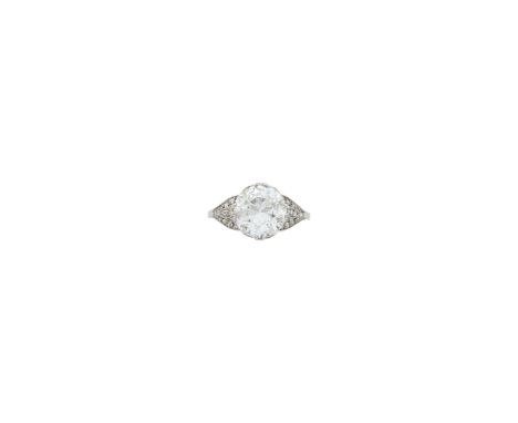 One old European-cut diamond weighing 2.95 cts., small old European-cut diamonds. Size 7 1/4. The center diamond has been wei