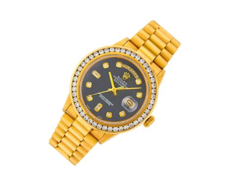 18 kt., automatic, round black dial, aftermarket diamond markers, luminous hands, sweep seconds, day and date aperture, after