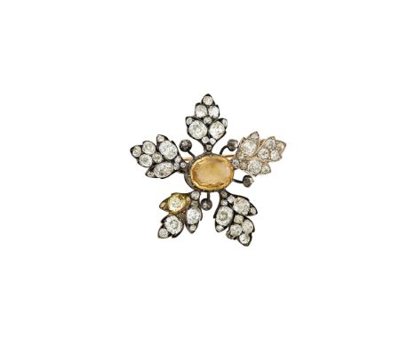 One oval yellow topaz , 11 old-mine cut diamonds ap. 2.75 cts., 42 old-mine cut diamonds ap. 2.25 cts., small old-mine and ro