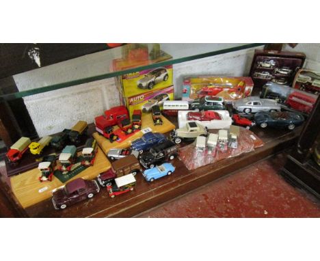 Shelf of model cars etc