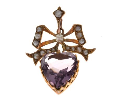 Edwardian amethyst and seed pearl pendant, stamped '9ct', the heart shaped stone suspended from a ribbon bow surmount, 2.6cm 