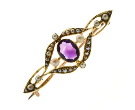 Edwardian amethyst and seed pearl brooch, unmarked, 4.4cm long, 4.6g gross  Condition: The oval amethyst approx 9mm x 7mm, pe